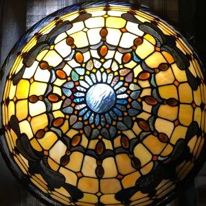 Stained glass light cover.